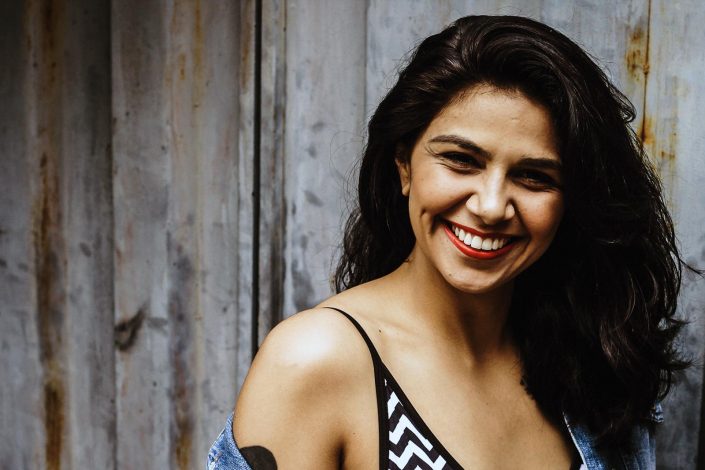 woman-smiling-striped